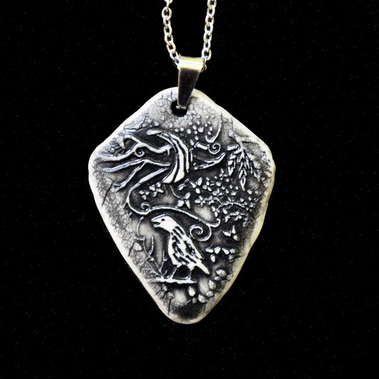 Crow Moon Pendant, vertical, handmade porcelain, kiln fired