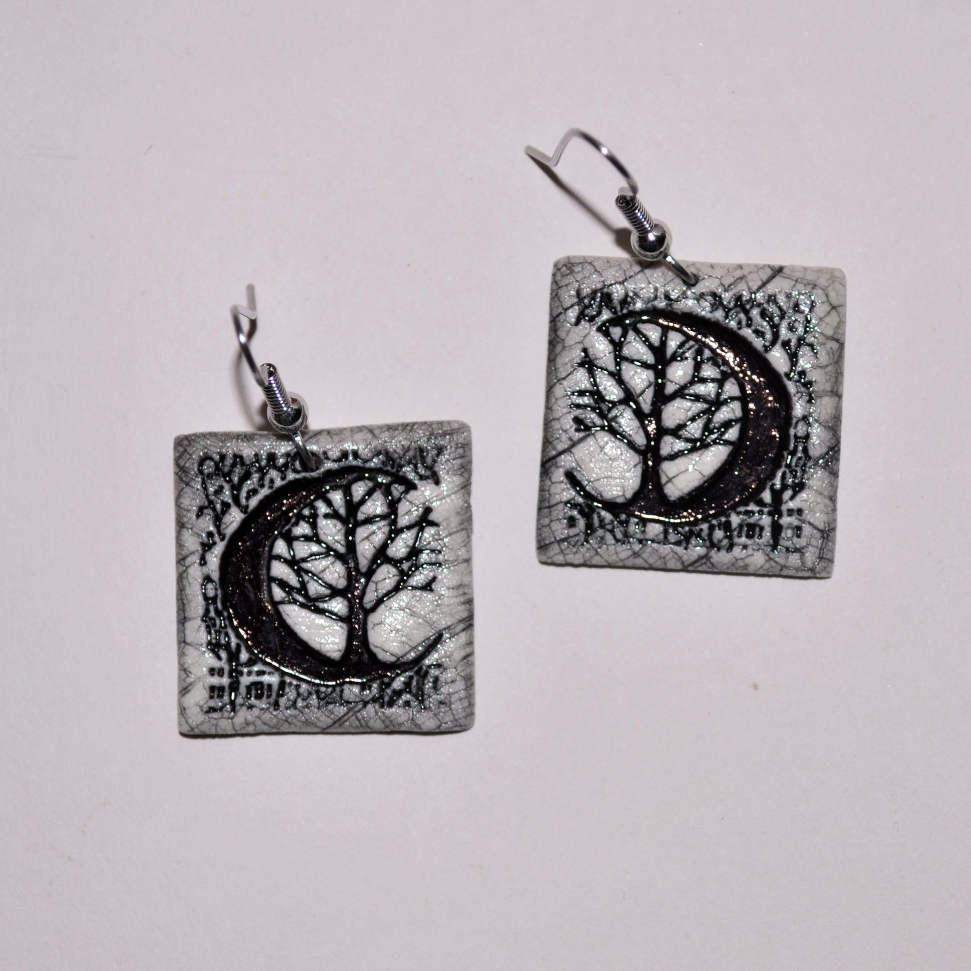 ems 725 crescent moon tree sq earrings loose.jpg