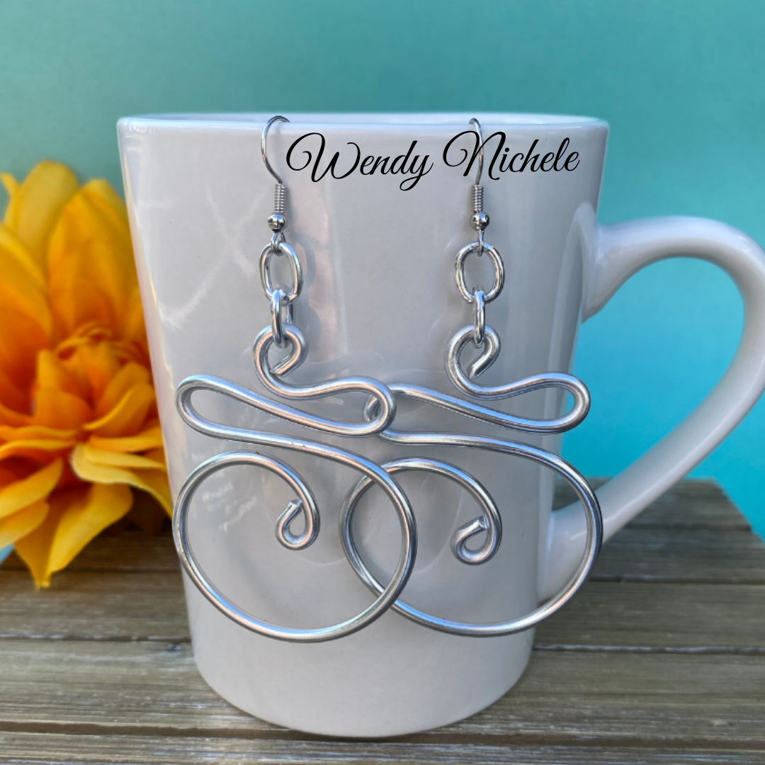 ribbon spiral on mug.webp