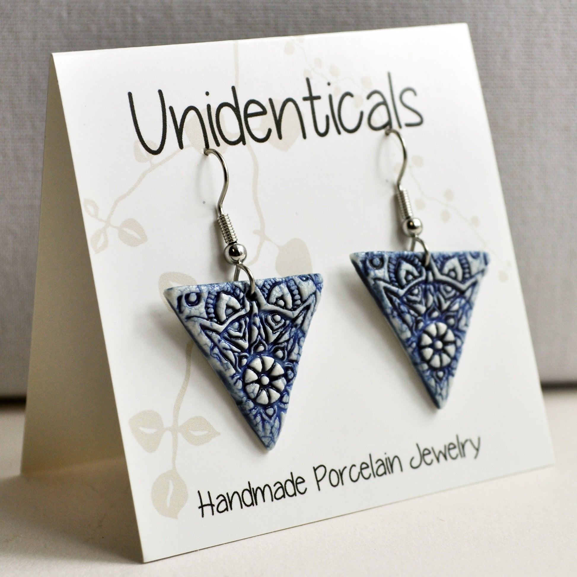 ET730 Earrings trianlge blue mandala on tent card.jpg