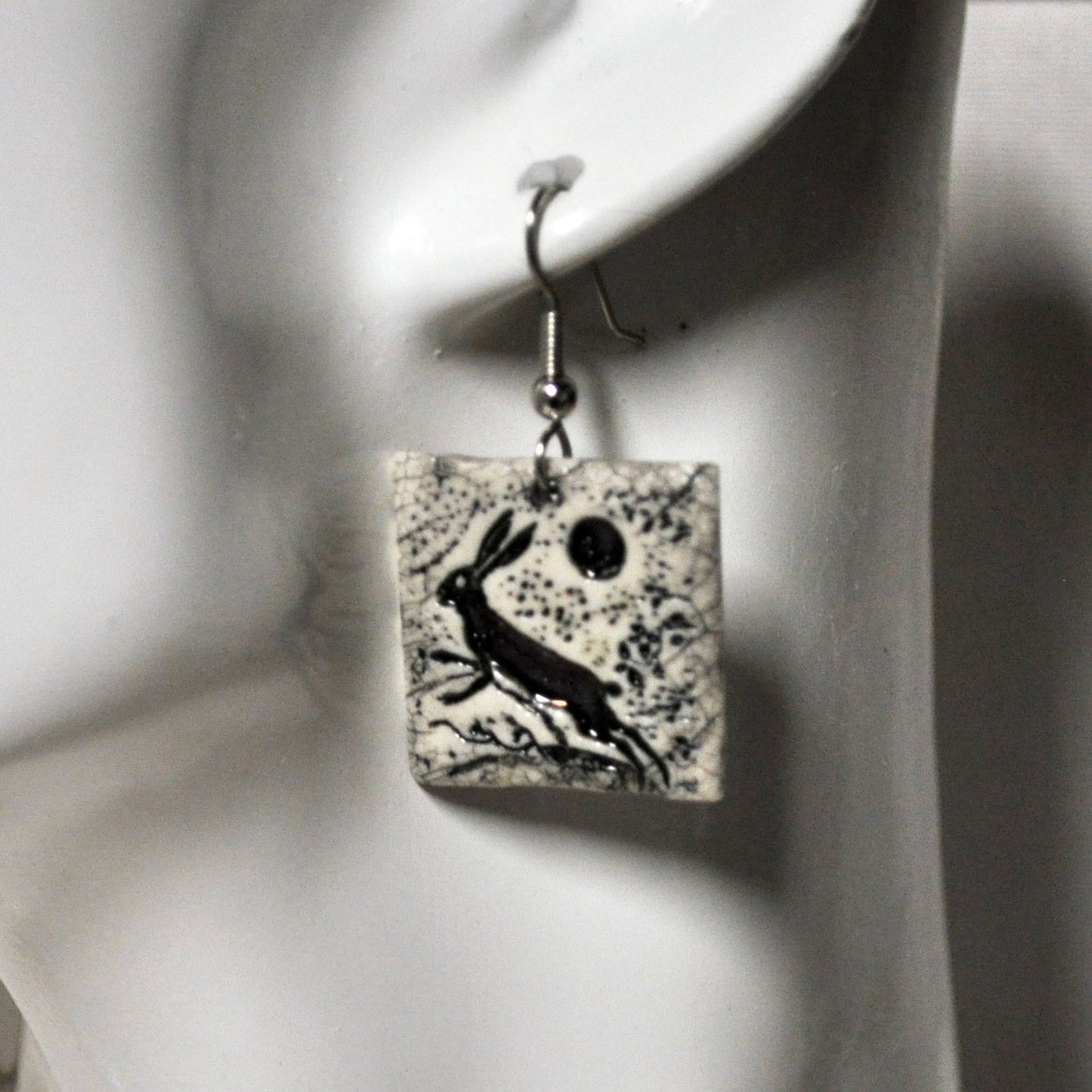 EMS723 rabbit moon square earrings on manequin.jpg